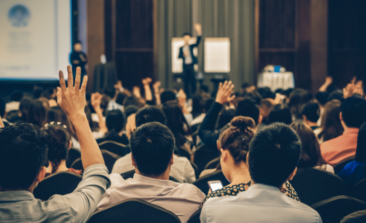 Students with their hands up