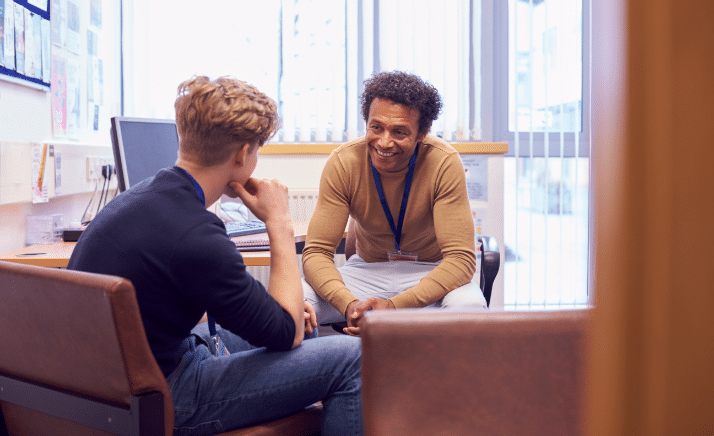 Student speaking to mentor