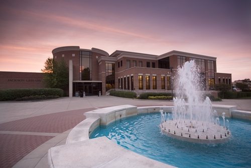 Outdoor view of college campus and water fountain
