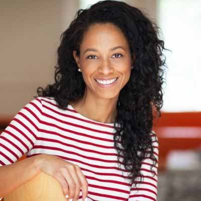 Smiling woman in striped shirt