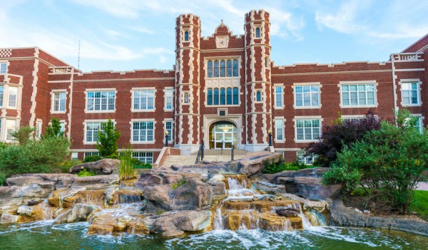 Outdoor view of college campus and rock fountain