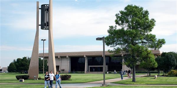 Students walking outdoors on school campus