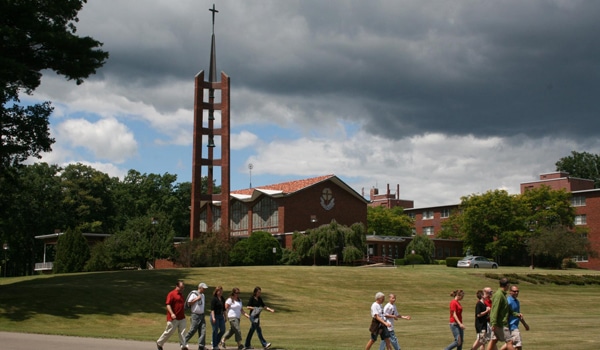Outdoor view of college campus and students walking