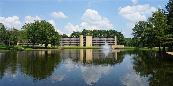 Outdoor view of school building and lake