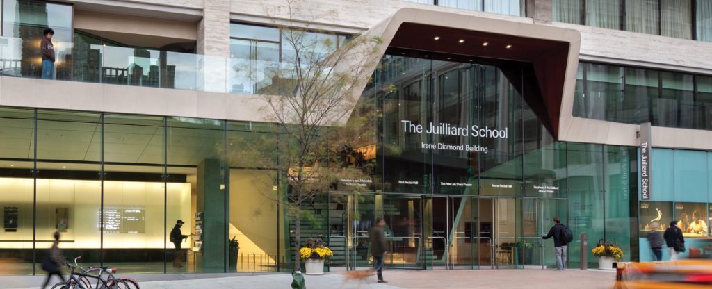 The Juilliard School building and students walking outdoors