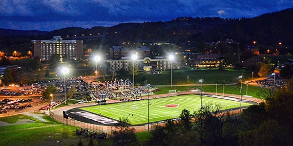 Outdoor view of college football stadium at night