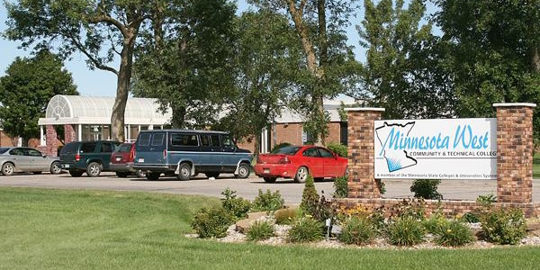 Minnesota West sign outdoors on campus near parking lot