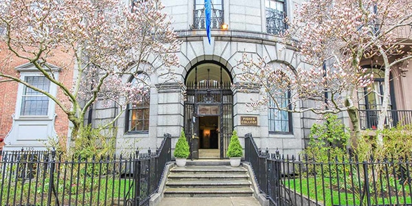 Fisher College Building and gate with stairs