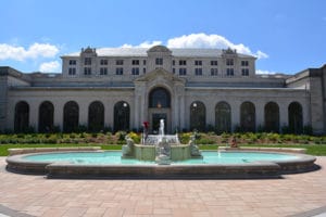 Outdoor view of college campus and fountain
