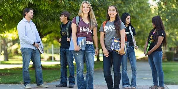 Group of college students standing together outdoors