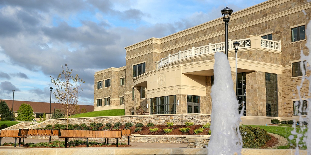 Outdoor view of college campus and water fountain