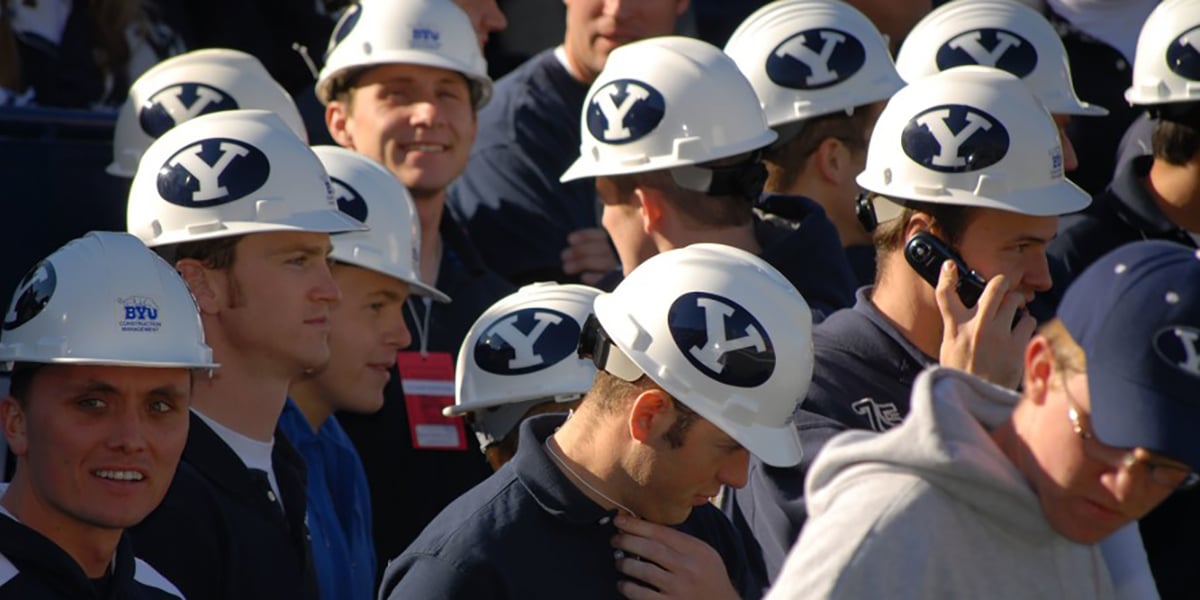 Group of students wearing hard hats outdoors
