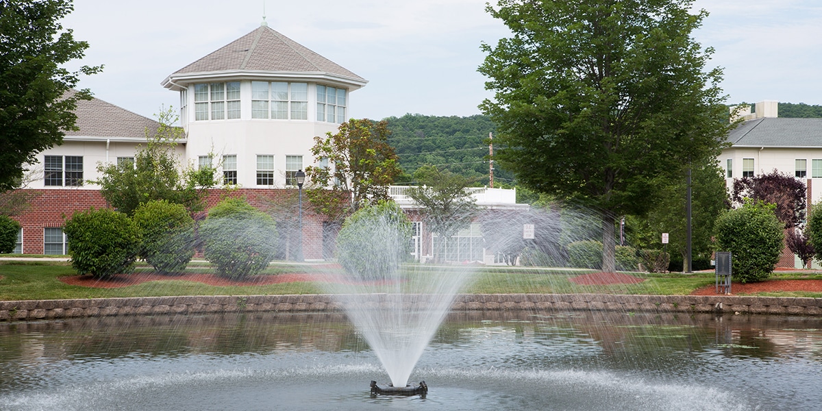 Outdoor view of college campus and fountain