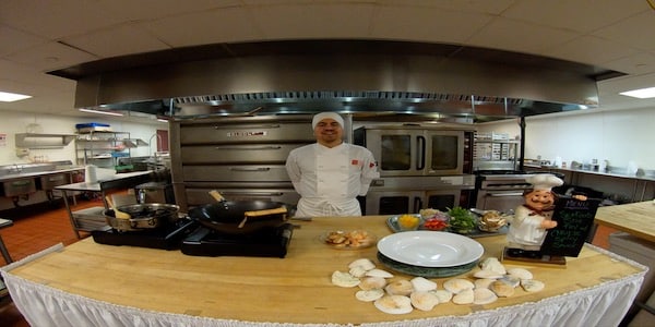 Culinary student standing in the kitchen