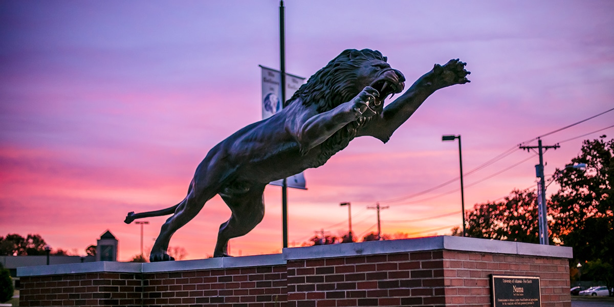 Statue of lion at college campus