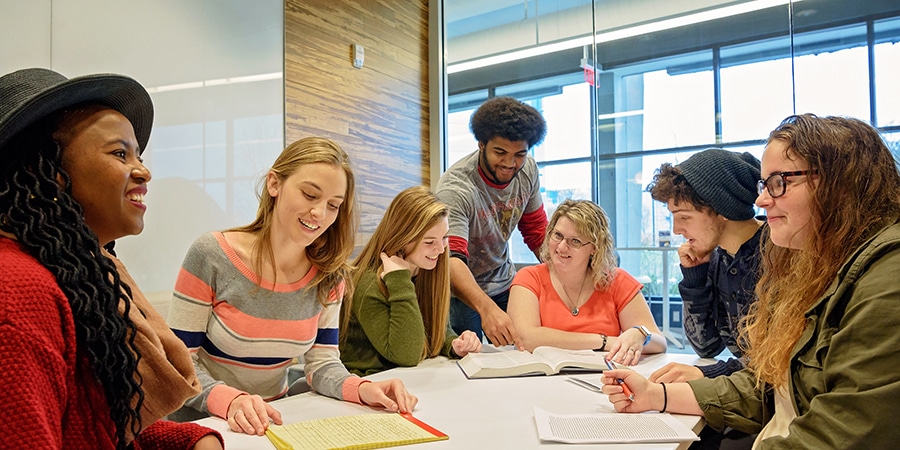 Group of college students studying