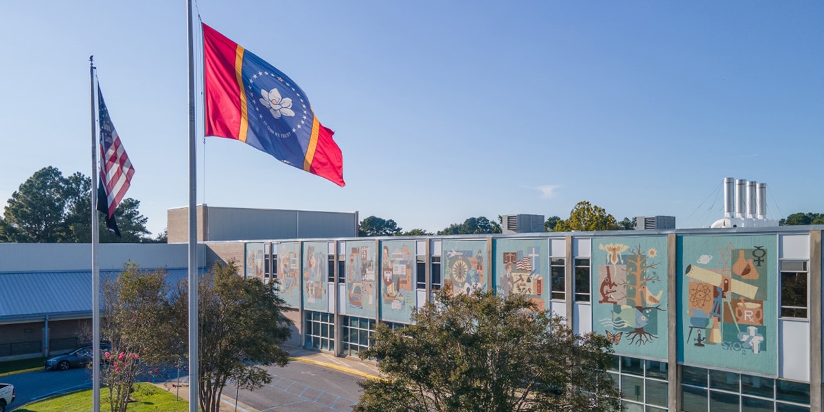 Outdoor view of college campus and flags