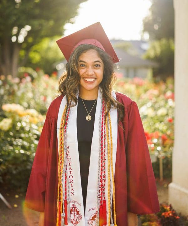 Woman in graduation cap and gown