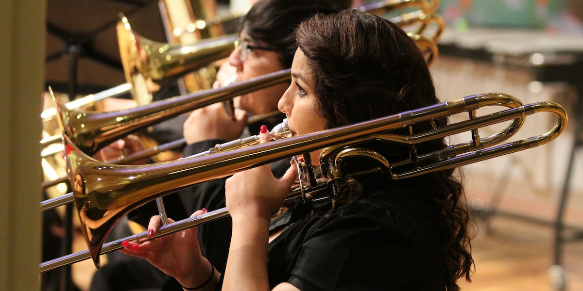 Students playing the trumpet