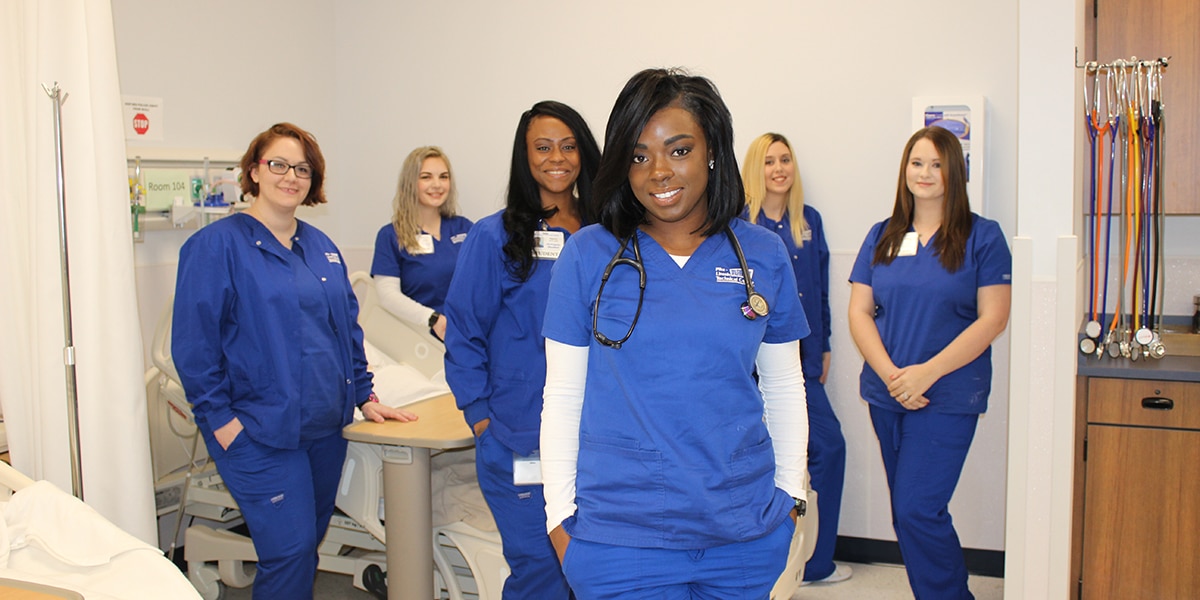 Female nursing students in a hospital room