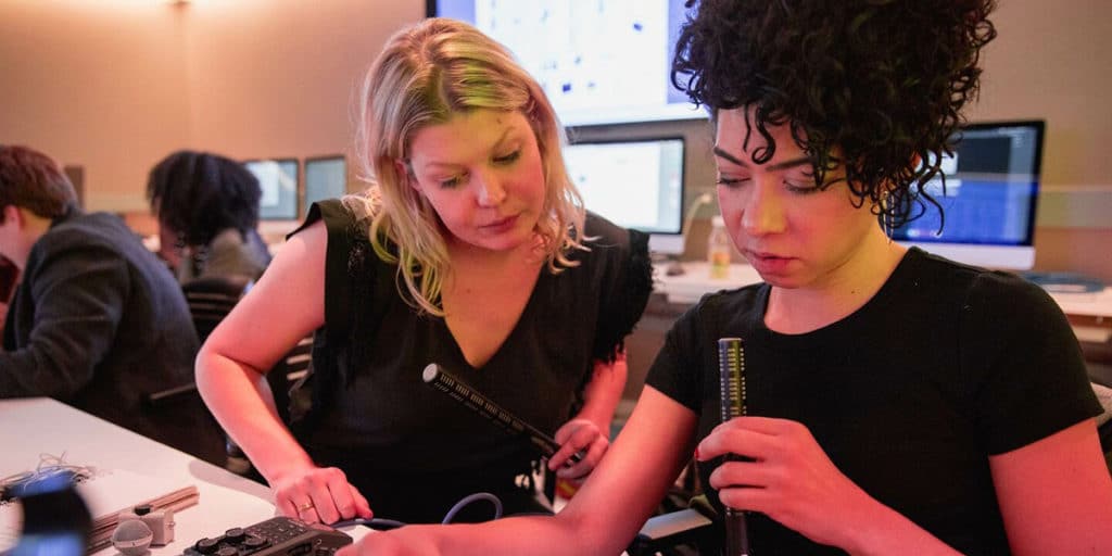 Students working with instruments in computer lab