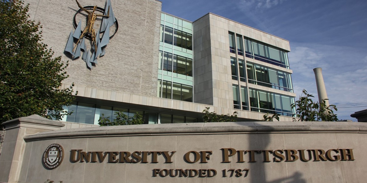 University of Pittsburgh outdoor sign and college building