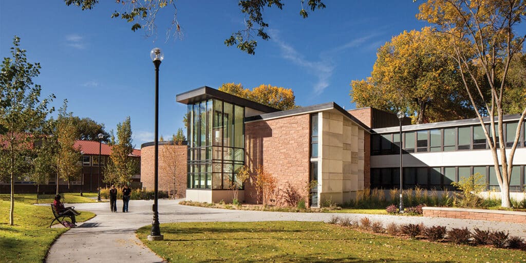 Outdoor view of college campus and students outdoors