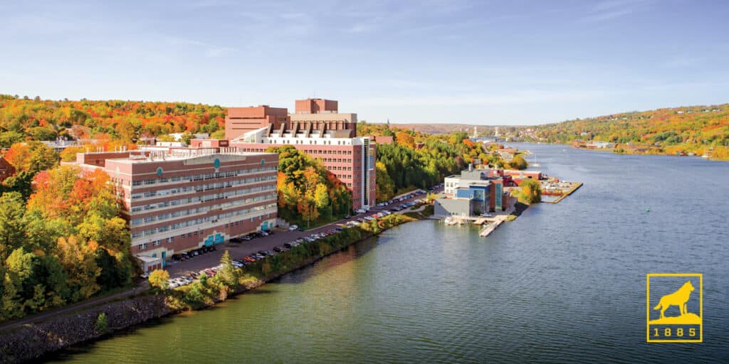 Outdoor view of college campus by river