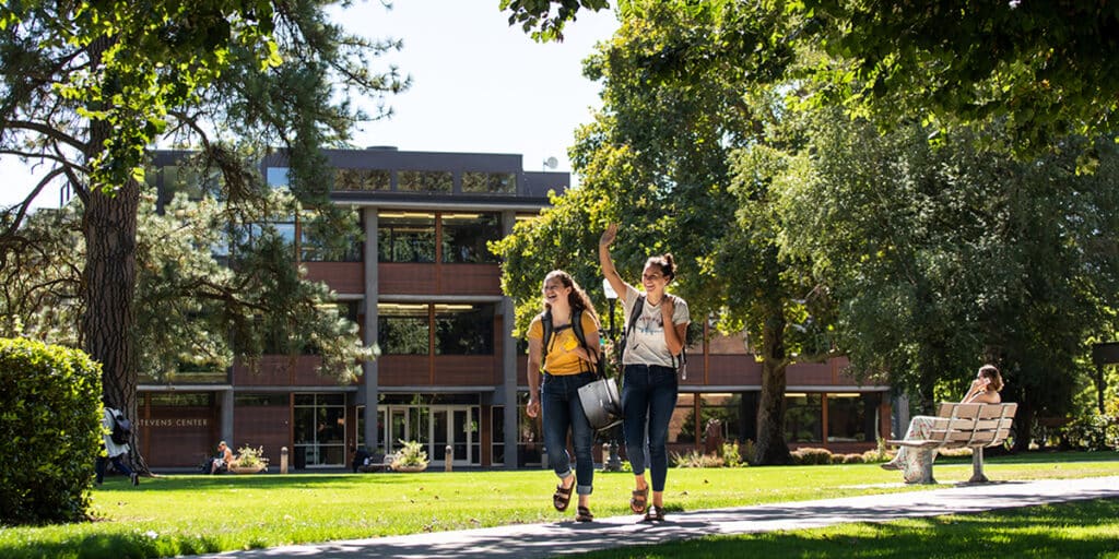 College students walking outdoors on campus