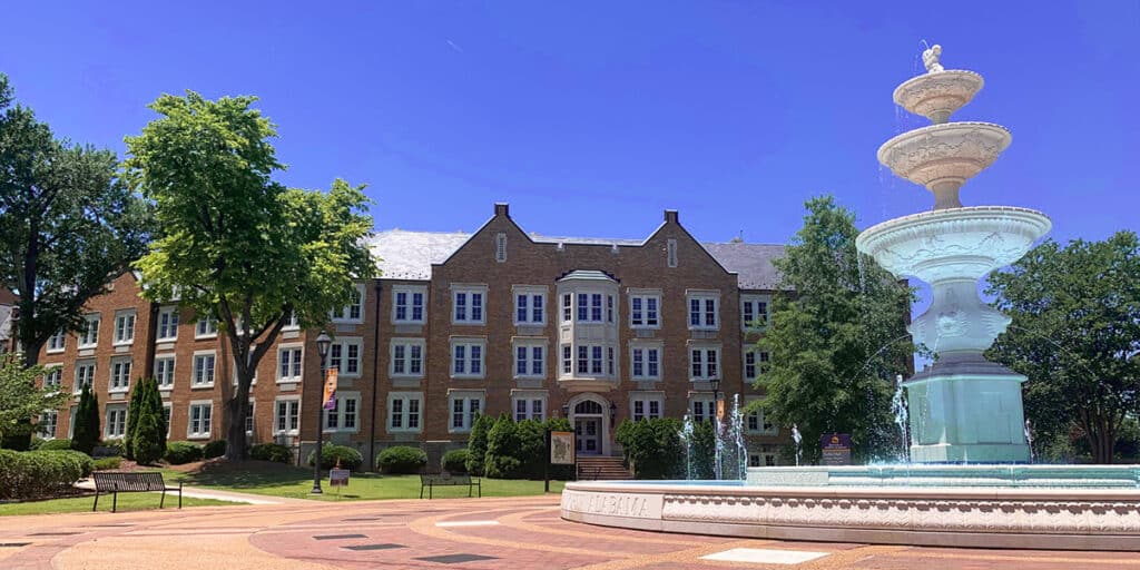 Outdoor view of college campus and fountain